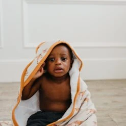 Copper Pearl Premium Knit Hooded Towel | Swift -The Baby's Crib CPJulyShoot22ACWEB 252 09f28b10 7ab5 4c92 b783 e61b79f26aea