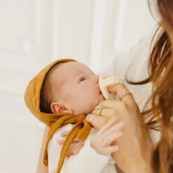 Copper Pearl Baby Bonnet | Camel -The Baby's Crib CPROBI22ACWEB 101 705d2d09 2887 4a8c bf8d f275c89e6d56