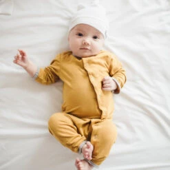 Copper Pearl Top Knot Hat | Dove 17 Copper Pearl Top Knot Hat | Dove -The Baby's Crib Copy of EmmylowephotoCopperPearlNov17 75 b6003cf3 024d 4dcd 96b7 dddf73c55686