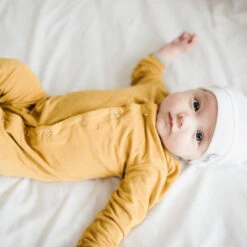 Copper Pearl Top Knot Hat | Dove 20 Copper Pearl Top Knot Hat | Dove -The Baby's Crib Copy of EmmylowephotoCopperPearlNov17 76 8b8a4845 0bda 41f1 9895 0468df721d5f