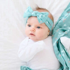 Copper Pearl Knit Headband Bow | Coral -The Baby's Crib copper pearl headband coral 1 f1681159 7c0e 4285 b82d 13275d7da068